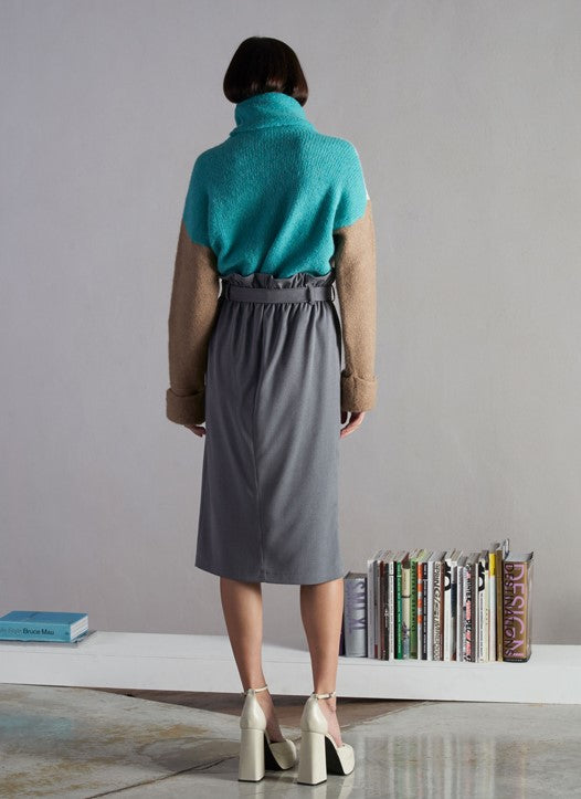 Cream, turquoise and tan wool jumper.