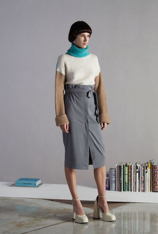 Cream, turquoise and tan wool jumper.