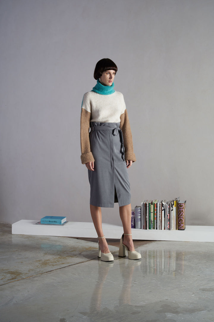 Cream, turquoise and tan wool jumper.