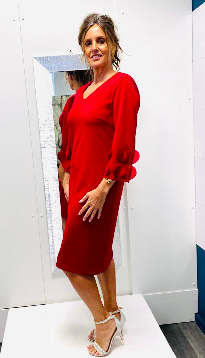 Red Peruzzi dress with flower cuff detail