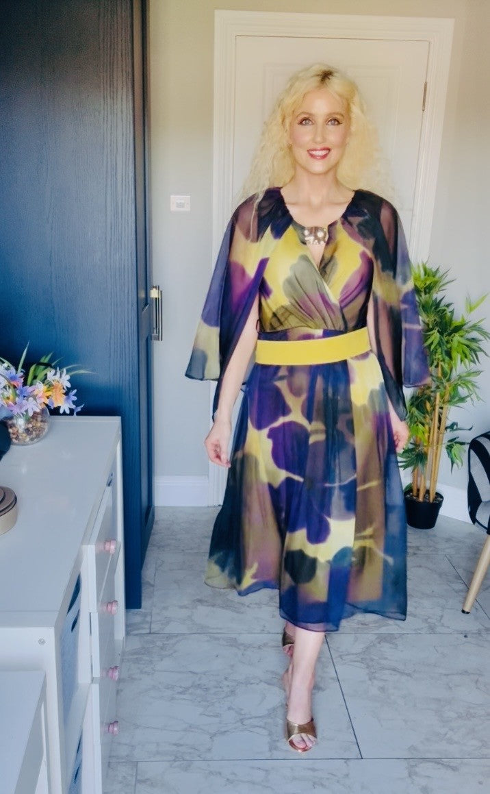 Purple and mustard dress with cape detail