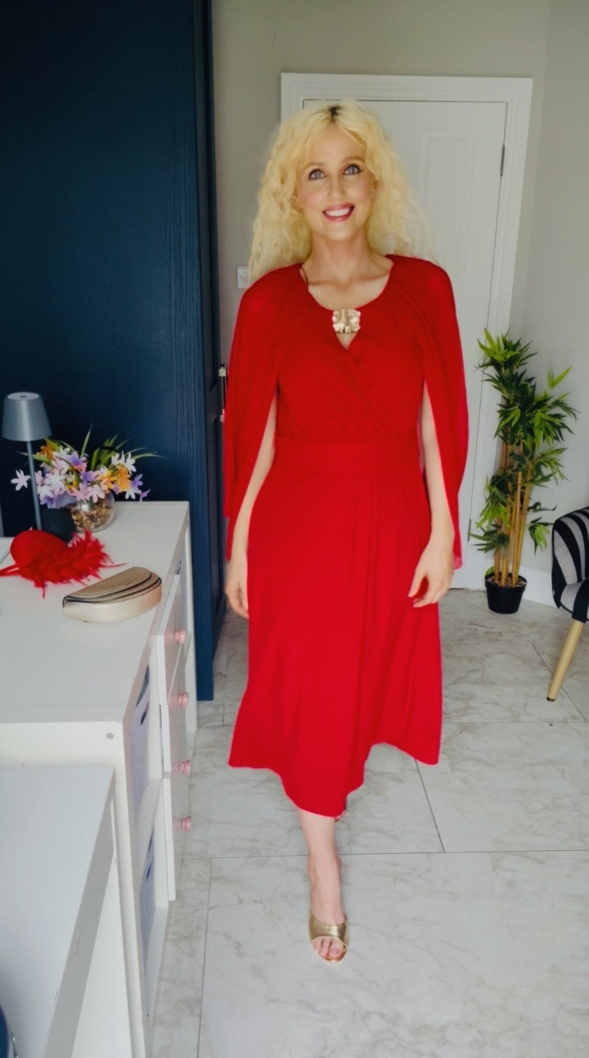 Red cape dress with gold broach detail