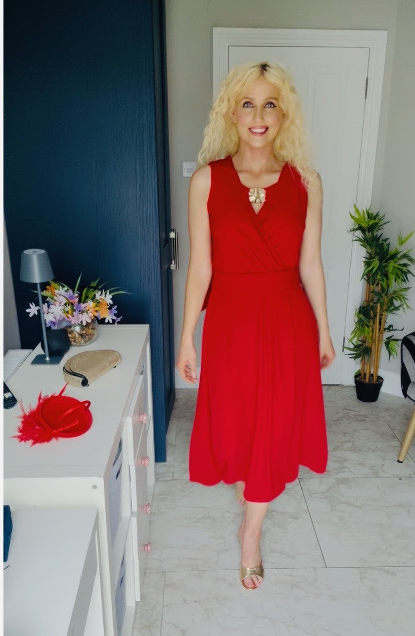 Red cape dress with gold broach detail